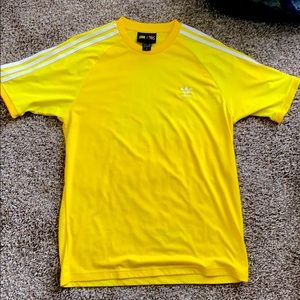 Adidas Pharrell Williams Human Yellow shirt.